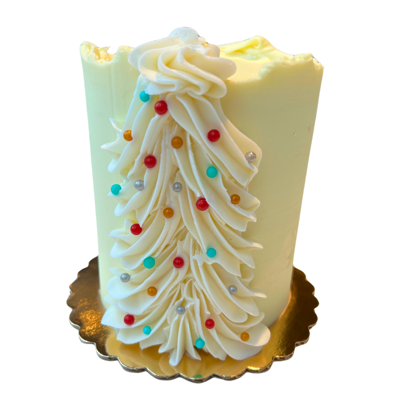 A Christmas tree cake with the baking … – License Images