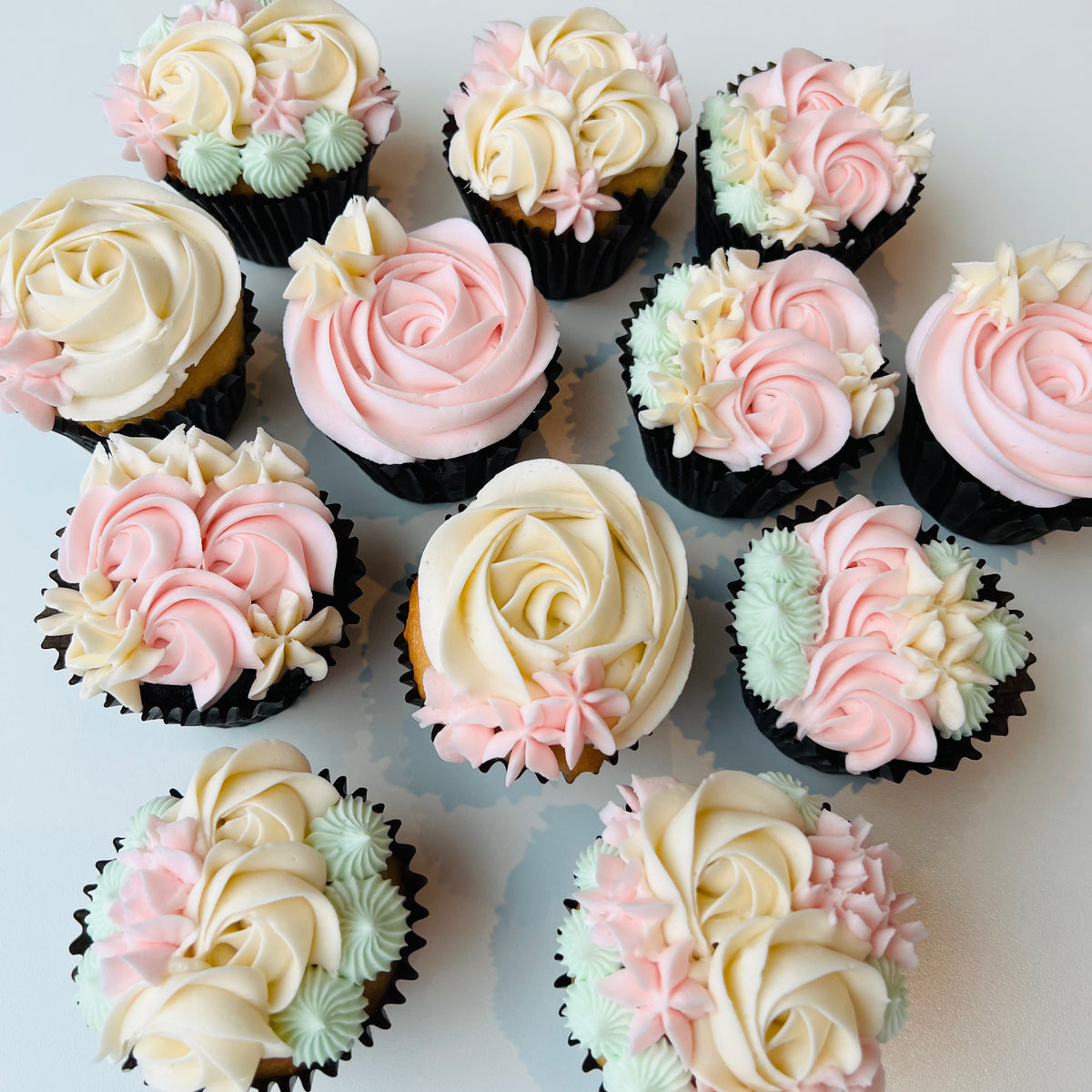 Floral baby shower deals cupcakes